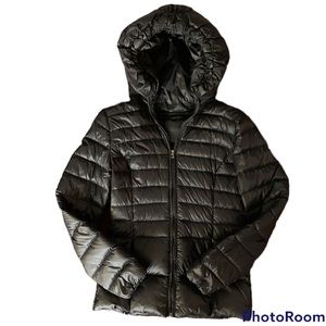 Black puffer coat with hood and hidden zipper pockets. Fits like small/medium.